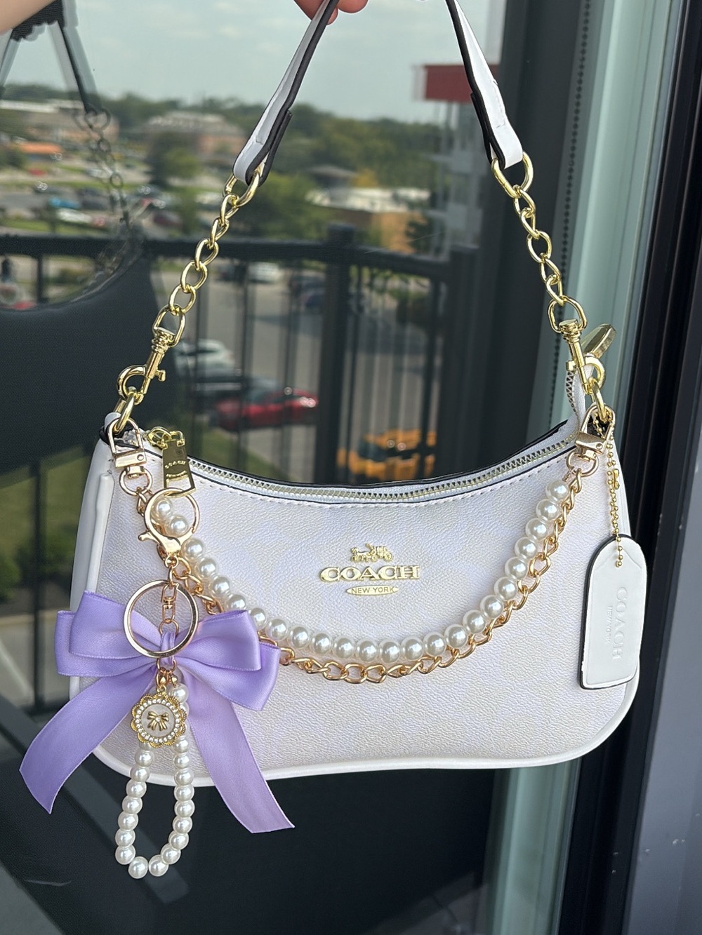 Coach Pearl-Trim White Shoulder Bag with Lavender Bow Charm